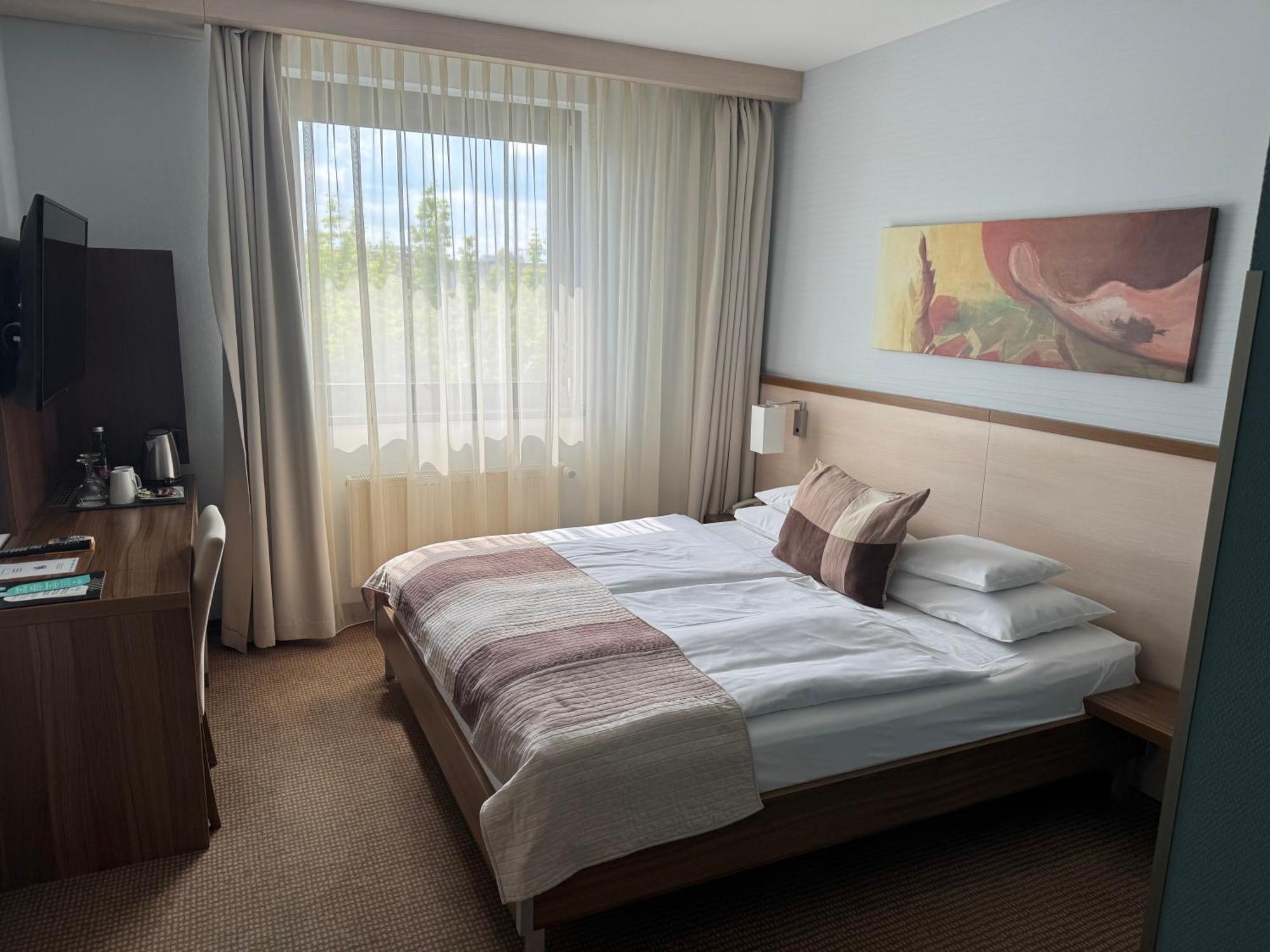 Hotel Famulus Ráb Pokoj fotografie